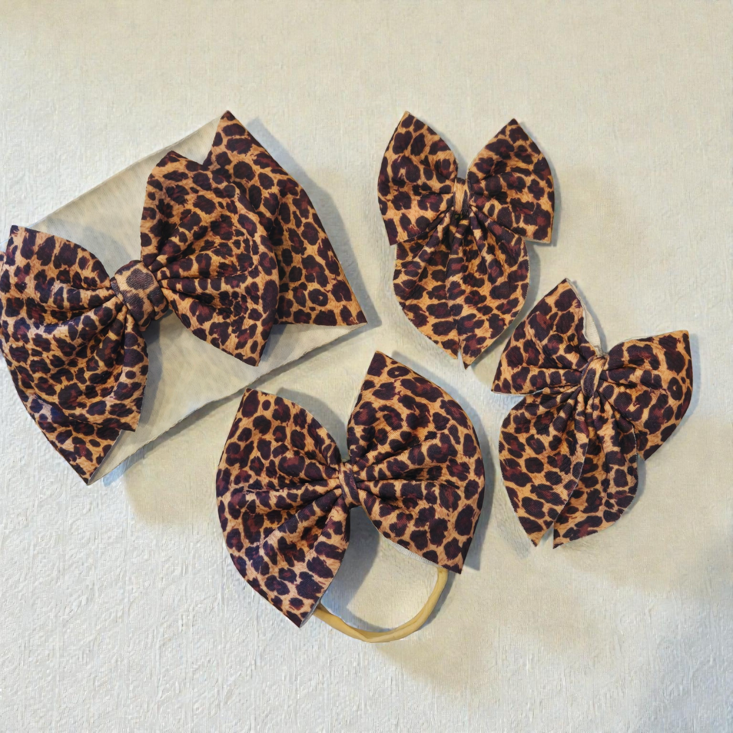 Leopard Print Bullet Fabric Hair Bow | Baby Headwrap, Nylon Headband & Piggie Bows | Trendy Cheetah Print Hair Accessories