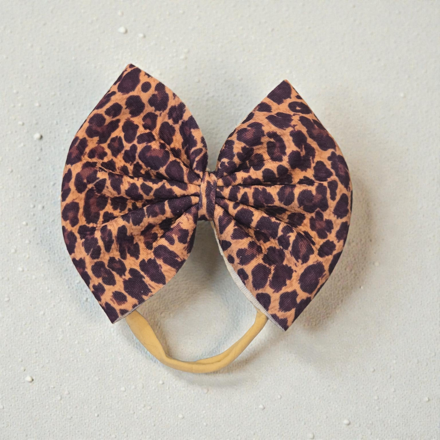 Leopard Print Bullet Fabric Hair Bow | Baby Headwrap, Nylon Headband & Piggie Bows | Trendy Cheetah Print Hair Accessories
