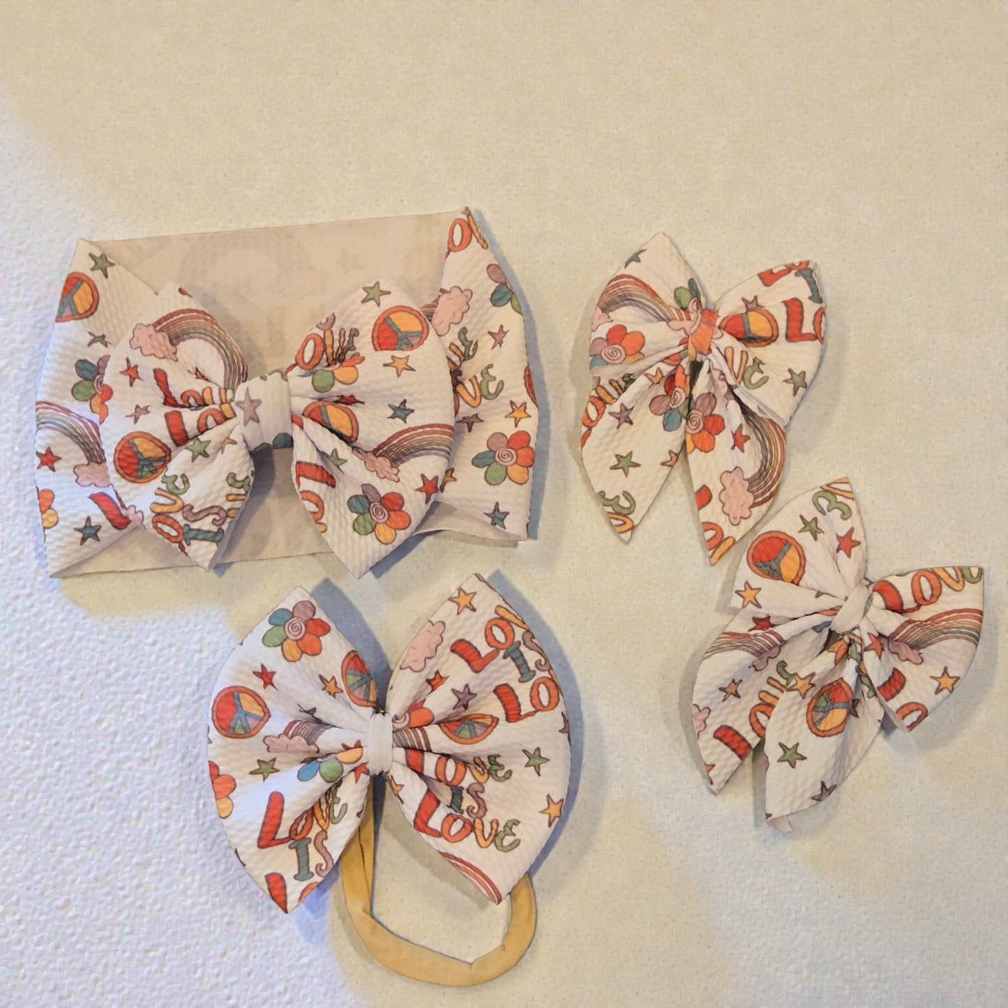 Groovy Love Bullet Fabric Hair Bow Set | Retro Rainbow Peace Sign Bows | Baby Headwrap, Nylon Headband & Piggies