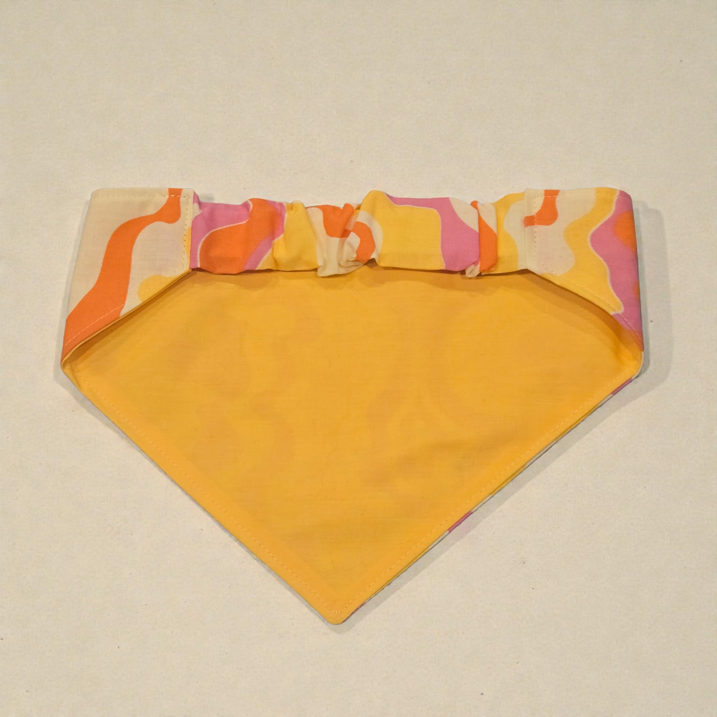 Orange & yellow groovy slip on scrunchie back bandana